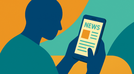 Afbeelding van iemand die nieuws leest op smartphone bij blog
